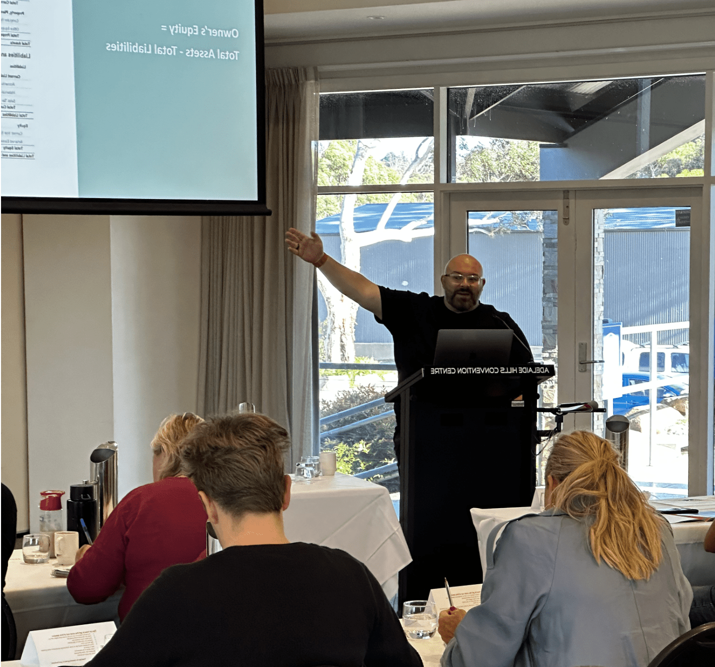 Kristian showing presentation by Kristian Livolsi